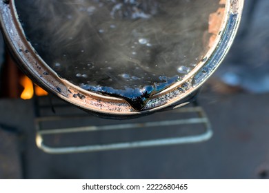 Drop Of Melted Hot Black Tar With Steam