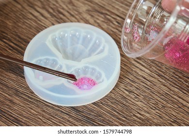 Drop Pink Resin Into Mold, Process Of Making Accessory From