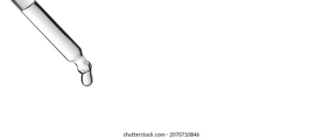 Drop of water falling from glass lab pipette isolated on white background. Macro
 - Powered by Shutterstock