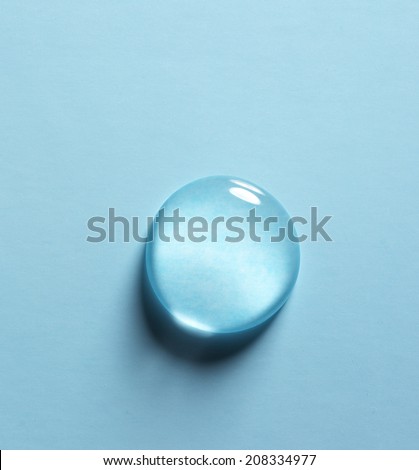 drop of water on a blue background