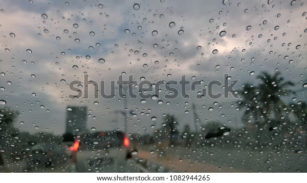 droplet rain with
the car glass with blurred

