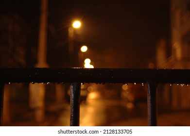 Droplets On Metal Bar Fence