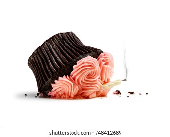 Dropped cupcake with candle and smoke isolated on white
