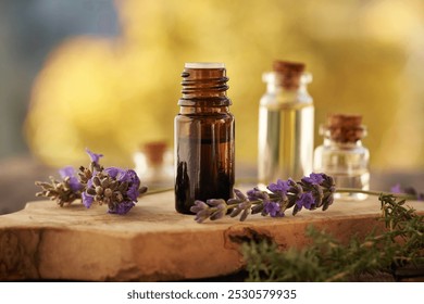 A dropper bottle of aromatherapy essential oil with fresh lavender flowers outdoors in autumn - Powered by Shutterstock