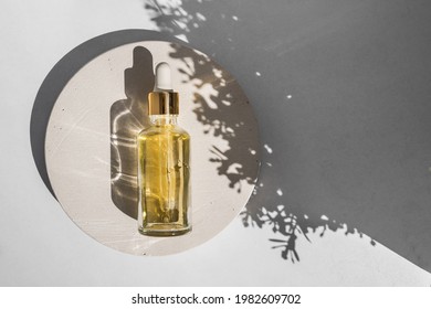 Dropper glass Bottle Mock-Up. Body treatment and spa. Natural beauty products. Eco cream, serum, skin care blank bottle. Anti-cellulite massage oil. Oily cosmetic pipette - Shutterstock ID 1982609702