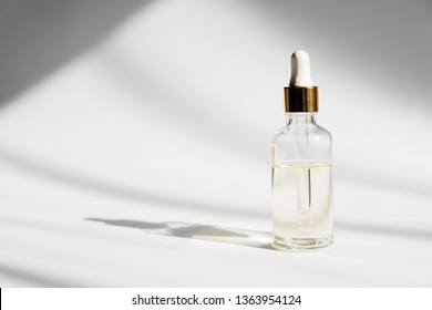 Dropper glass Bottle Mock-Up. Сosmetic pipette on white background. 