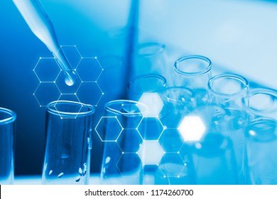 Dropping chemical liquid to test tube, laboratory research and development concept. scientist sample chemistry or medicine test - Shutterstock ID 1174260700