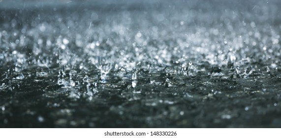 Drops Of Heavy Rain On Water