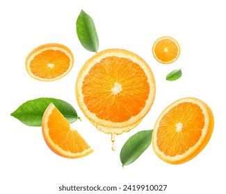 drops of juice from orange half and slices Falling juicy oranges with green leaves flying. defocusing. applicable for advertising - Powered by Shutterstock