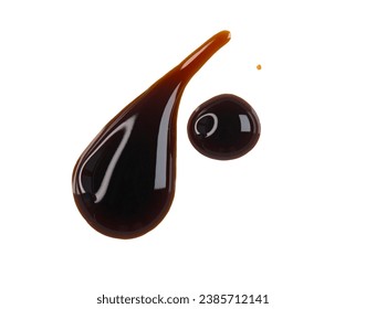 Drops of liquid brown sauce unagi, soy isolated on white, clipping path