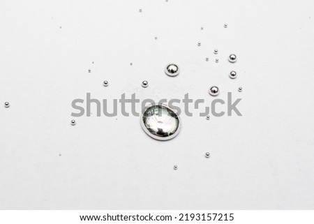drops of metallic liquid mercury