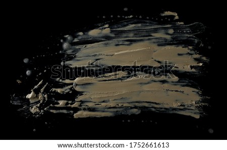 drops of mud sprayed isolated on black background, with clipping path