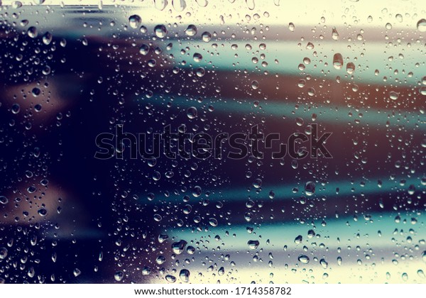 Drops Rain On bumper car in rainy\
days.In the rainy season,water drop on the bumper Silver\
metal