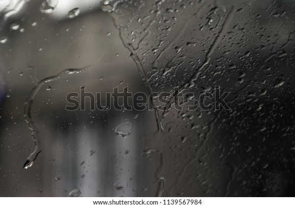 drops of rain on the car\
window