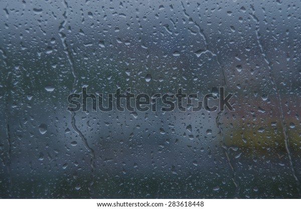 Drops of the rain on the\
home window