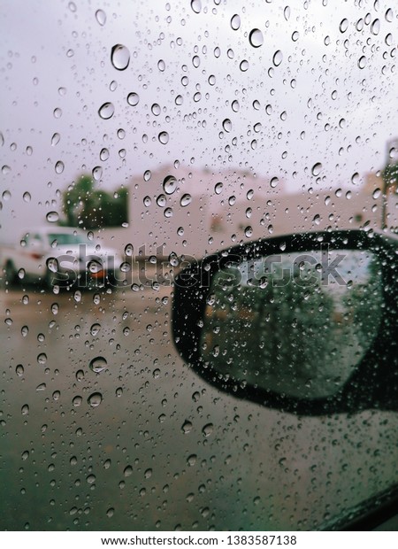 drops of Rain on my\
car