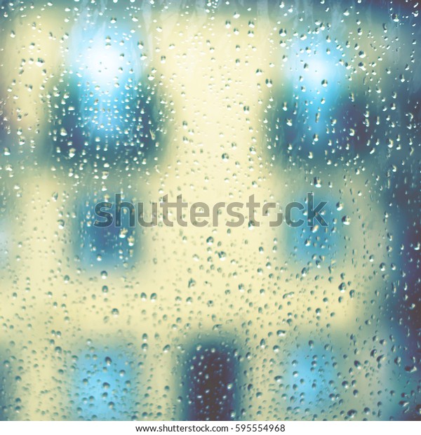 Drops Of Rain On Window as\
Background. Rainy autumn day. Soft colors, depressive\
image\
\
