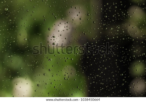 drops rain on windowglass background screensaver stock photo edit now 1038450664 shutterstock