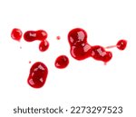 Drops and stains of red berry jam, sauce isolated on white
