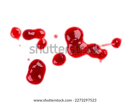 Drops and stains of red berry jam, sauce isolated on white