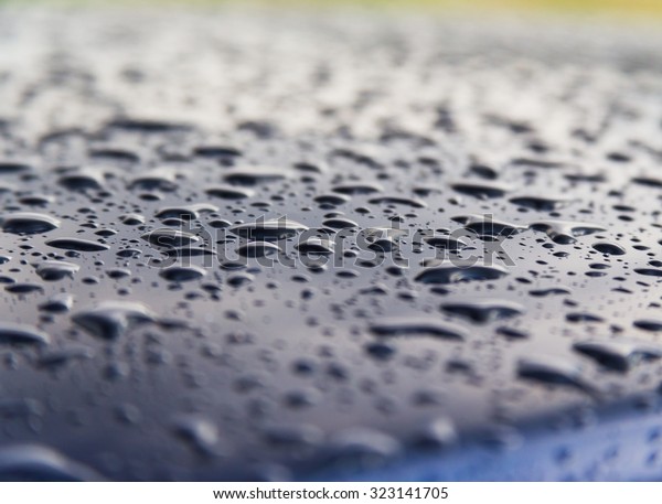 drops of water on the car\
after rain