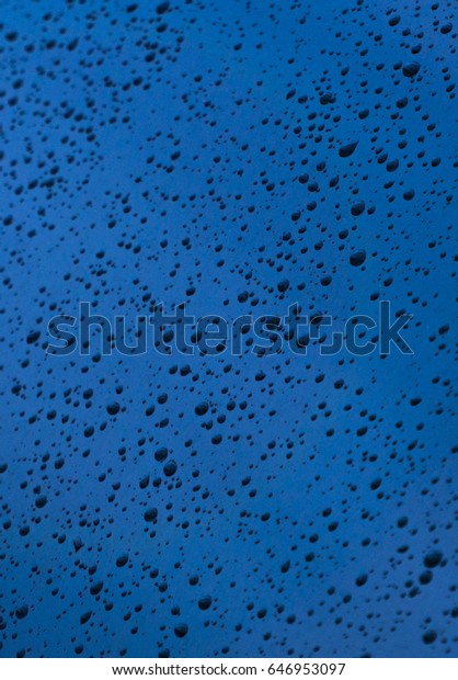 Drops\
of water on the car window color, nature\
background