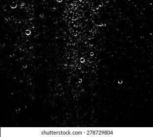 drops of water on a dark glass