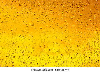 Drops Of Water On A Glass Of Beer. Background, Texture