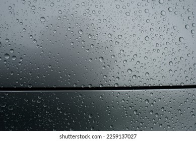 Drops of water on a gray background. Selective focus. Grey colour - Shutterstock ID 2259137027