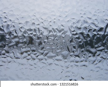 Drops of water on the window close up