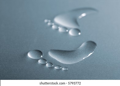 Drops Of Water That Look Like Bare Footprint