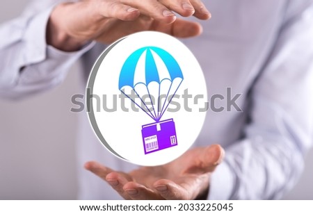 Dropshipping concept between hands of a man in background