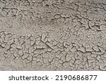 Drought dry soil desert land barren eroded ground dust bowl with cracks