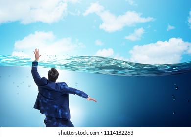 Drowning businessman in insolvency and bankruptcy concept
