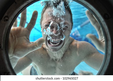 Drowning Man Underwater Diver