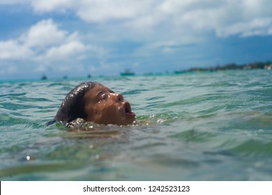 drowning person in the water
