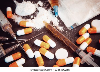 Drug abuse Concept. Opioid epidemic .Opioid Pills. Syringe preparation spoon and prepared the heroin. Stop the use of drugs.