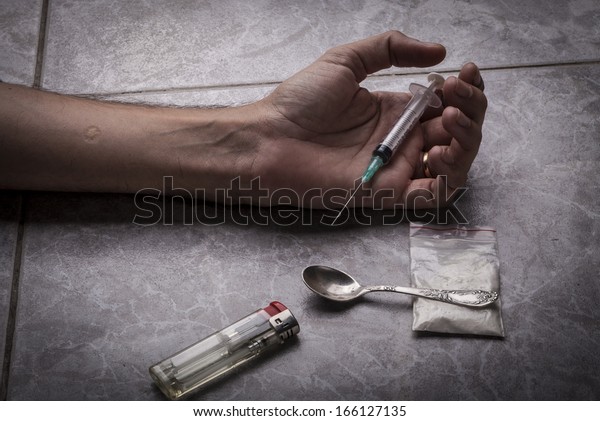 Drug Addict Hand Syringe On Floor Stock Photo (Edit Now) 166127135