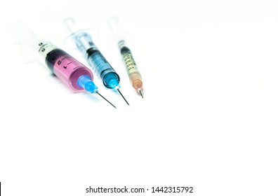 Drug Combination Therapy For Virus Diseases. Syringes On The White Background