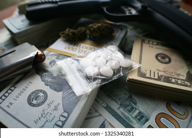 Drug Dealer Concept With Gun, Pills, Marijuana & Cash 