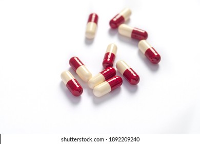 Drug prescription for treatment medication. Pharmaceutical medicament,  Pharmacy theme, Heap of red white medicament - Shutterstock ID 1892209240