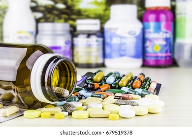 Drug prescription for treatment medication. Pharmaceutical medicament, cure in container for health. Pharmacy theme, capsule pills with medicine antibiotic in packages.closeup,Medicine or capsules. - Shutterstock ID 679519378