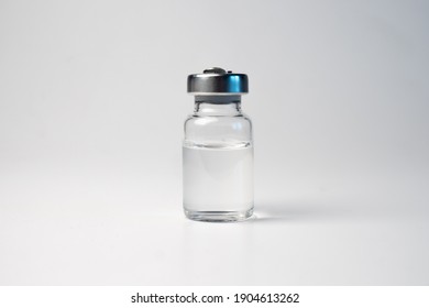 Drug Sample. Pharmaceutical Test. Liquid Solution In Glass Bottle Isolated On White