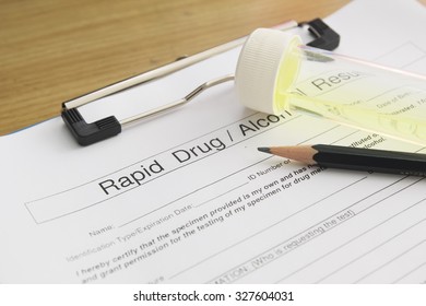 Drug Test Blank Form With Pen And Urine