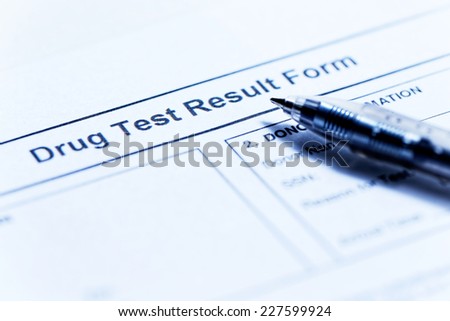 Drug test blank form with pen
