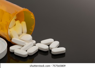 Drugs Pills Opioids Spilled Out On Table White Tablets