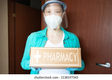 Drugstore Delivery, Courier With Medicines Stands Near The Door In The Apartment, Online Ordering Of Pharmaceuticals