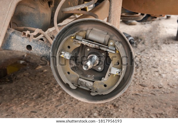 Drum Brake\
of car, close-up of the back brake\
pads.