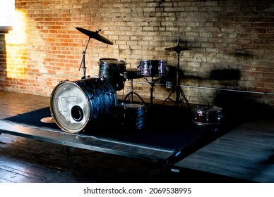 A Drum Kit In An Old Empty Room.