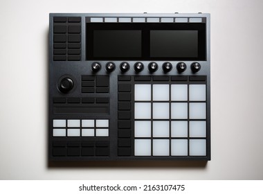 Drum machine for hip hop beat maker. Professional pad controller device for electronic music production. Curated collection of royalty free music images and photos for poster design template
